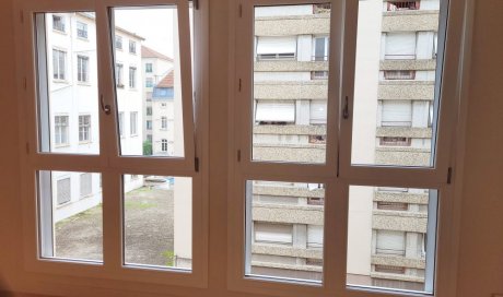 Installation de fenêtres en bois et volets roulants solaires à LYON 6