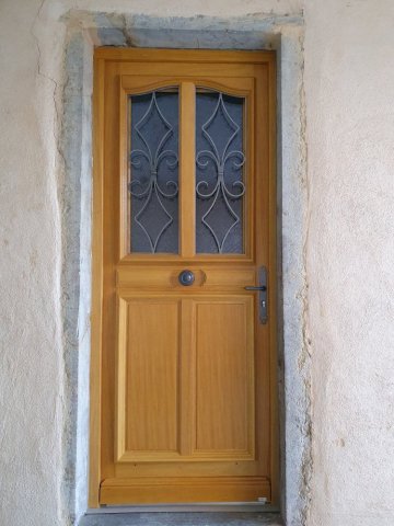 Rénovation d’une porte en bois vitrée à Dardilly