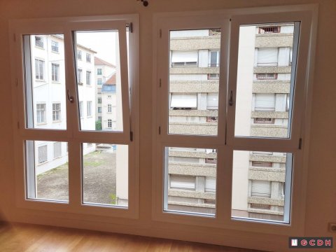 Installation de fenêtres en bois et volets roulants solaires à LYON 6